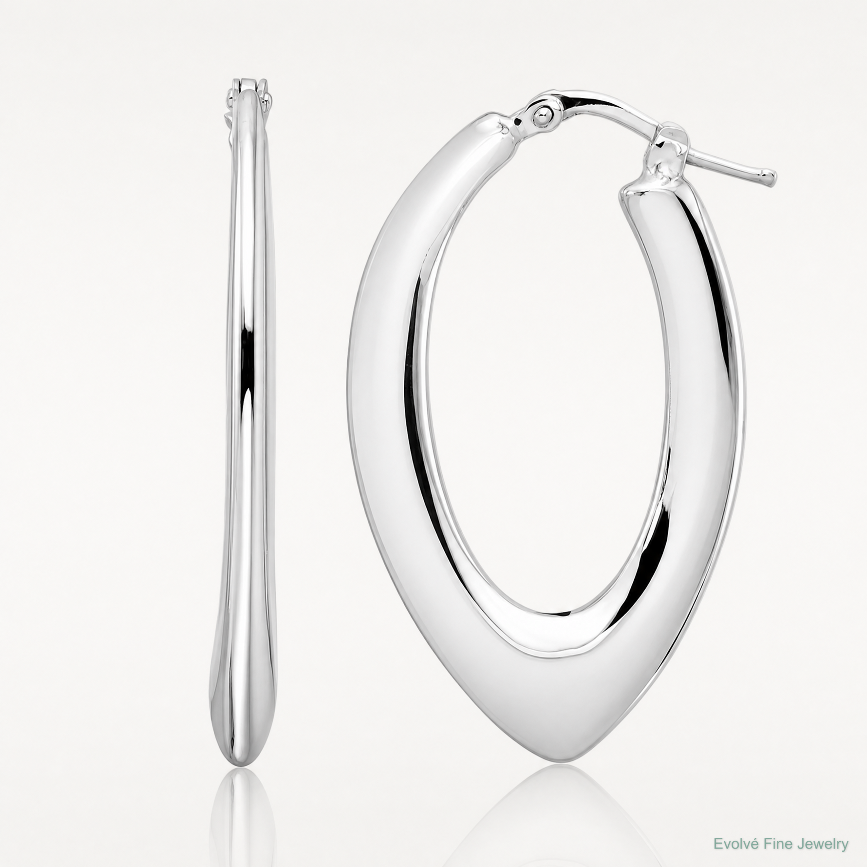 Leslie's Sterling Silver Rhod-plated Polished Oval Hoop Earrings - Lifestyle View