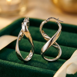 Leslie's Sterling Silver RH-plated Polished Twisted Hoop Earrings - Lifestyle View