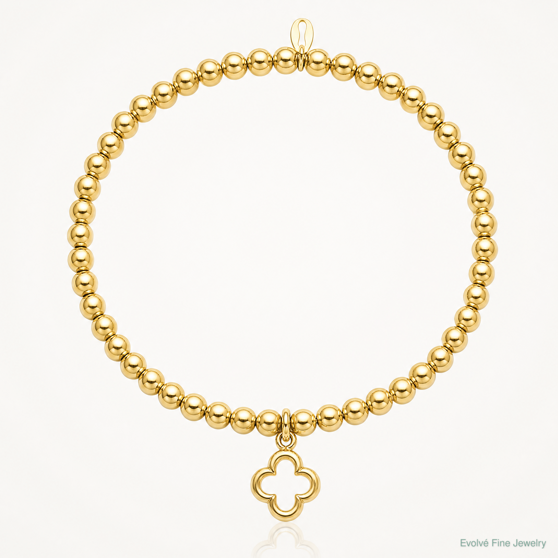 Leslie's Sterling Silver Gold-tone Polished Beads w/Charm Stretch Bracelet - Lifestyle View