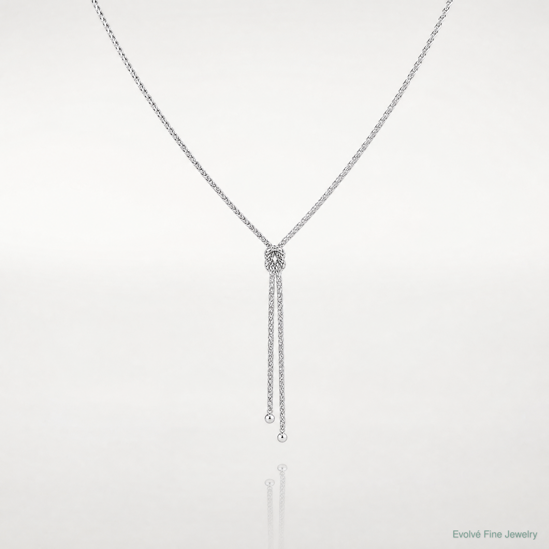 Leslie's Sterling Silver RH-plated Pol. w/Knot Drop w/2in ext. Necklace - Lifestyle View