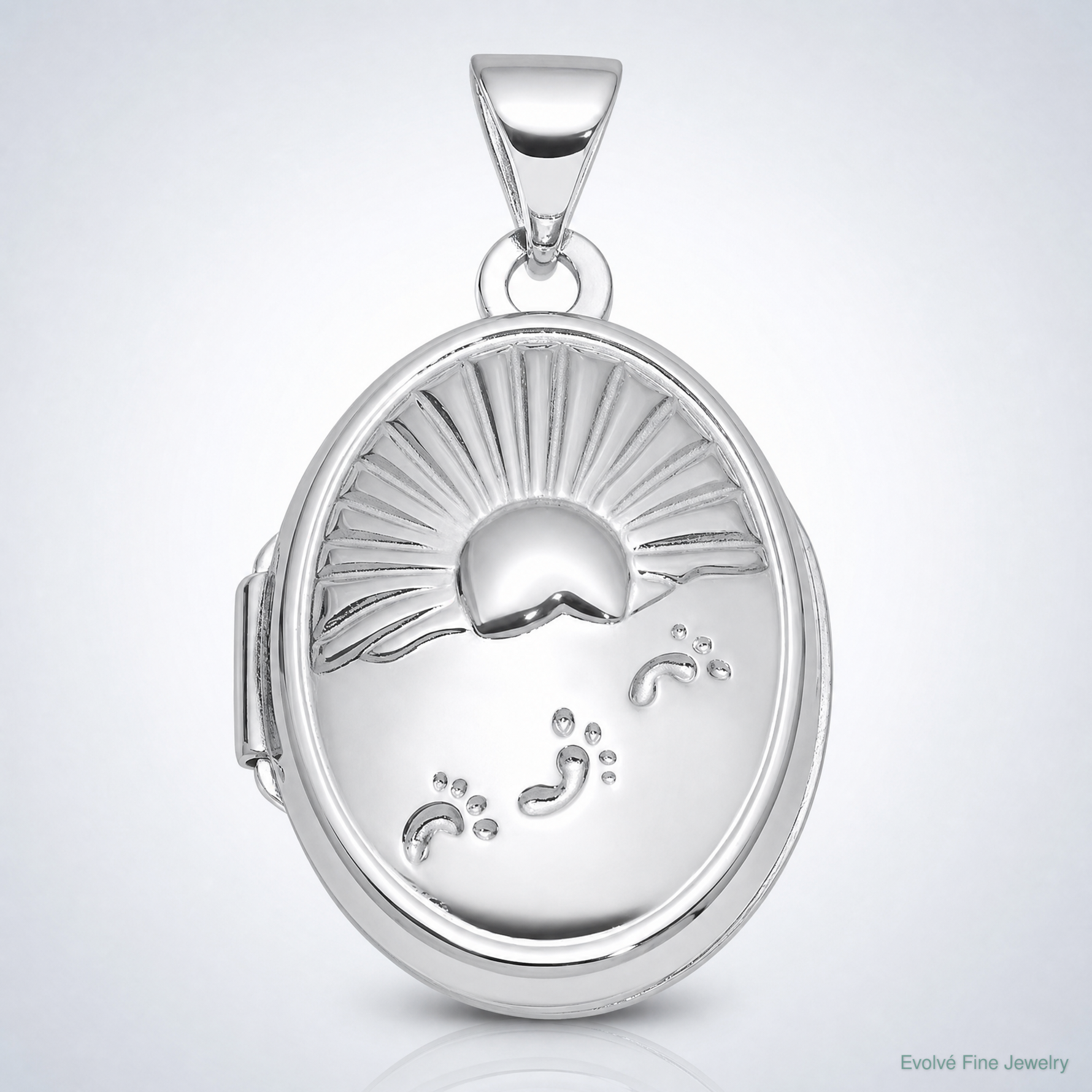Sterling Silver Rhod-Plated 19x15mm Foot Prints Reversible Oval Locket - Lifestyle View