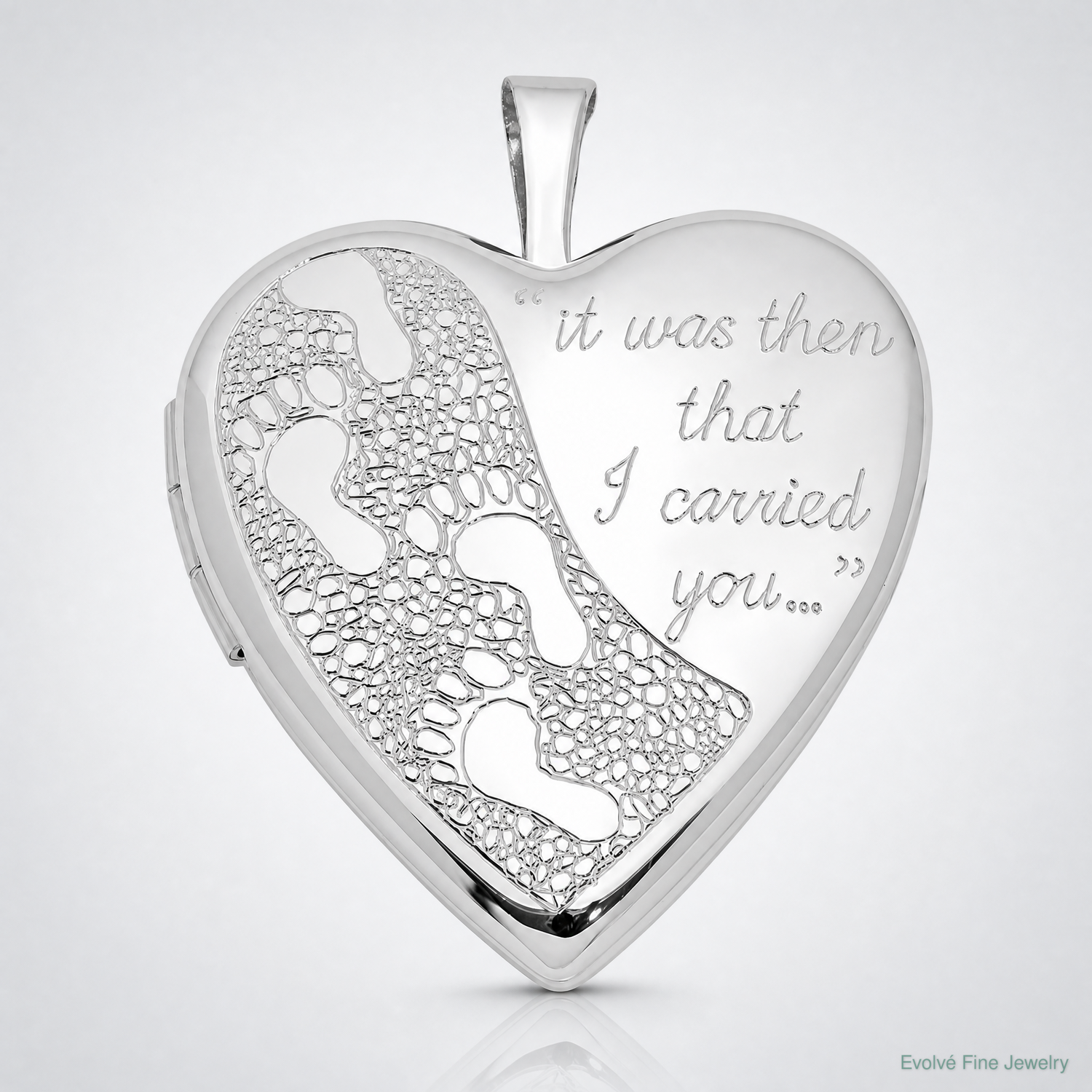 Sterling Silver Rhodium-plated 20mm Footprints Heart Locket - Lifestyle View
