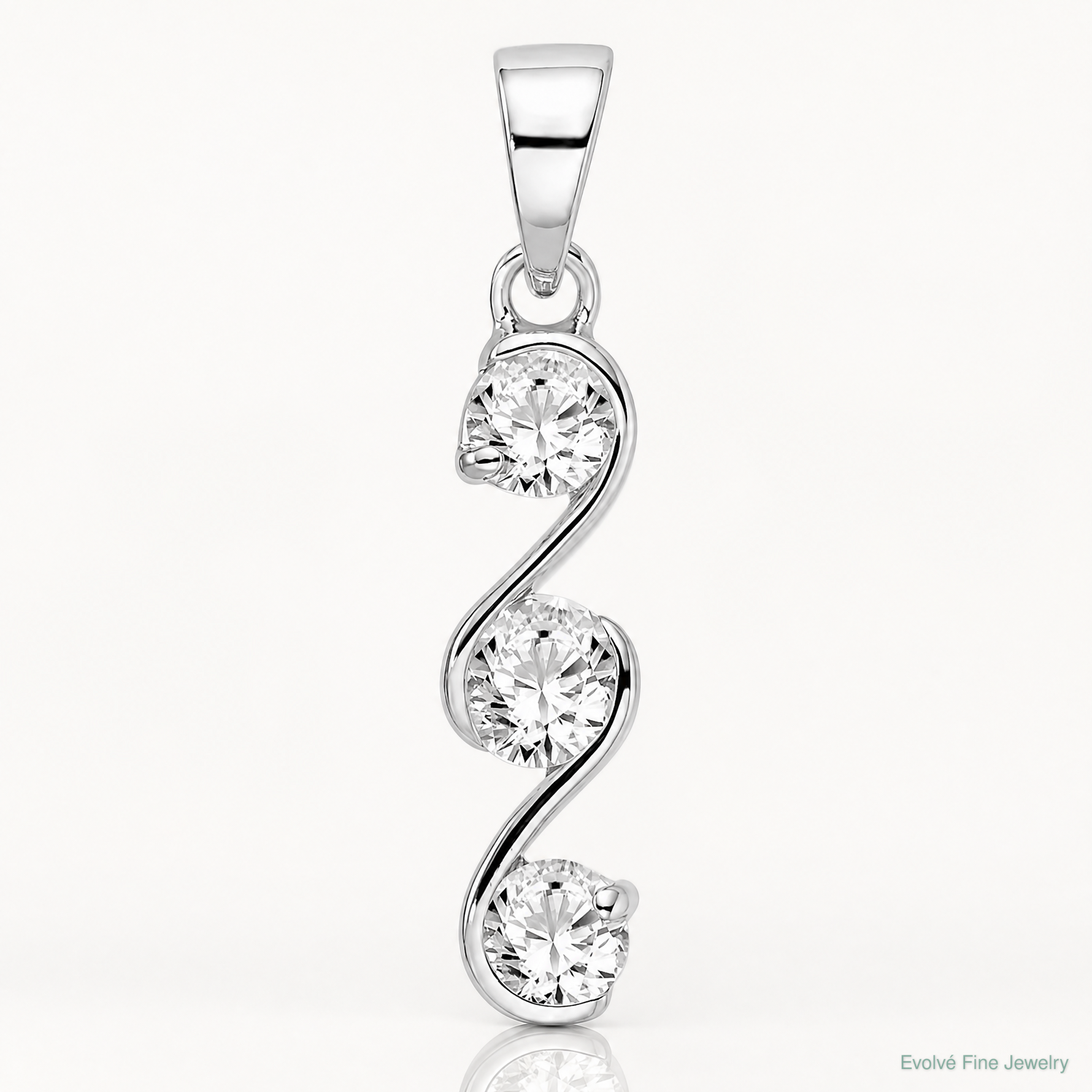 Sterling Silver Rhodium-plated Swirl 3-stone CZ Pendant - Lifestyle View