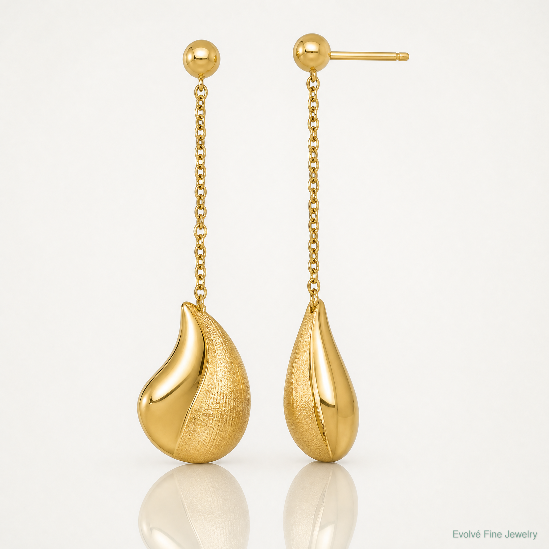 14k Polished And Brushed Curved Teardrop Dangle Post Earrings - Lifestyle View