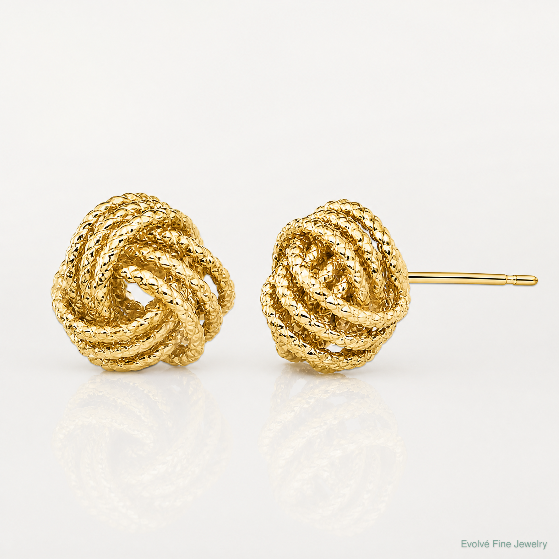 14k Polished & Twisted Love Knot Post Earrings - Lifestyle View