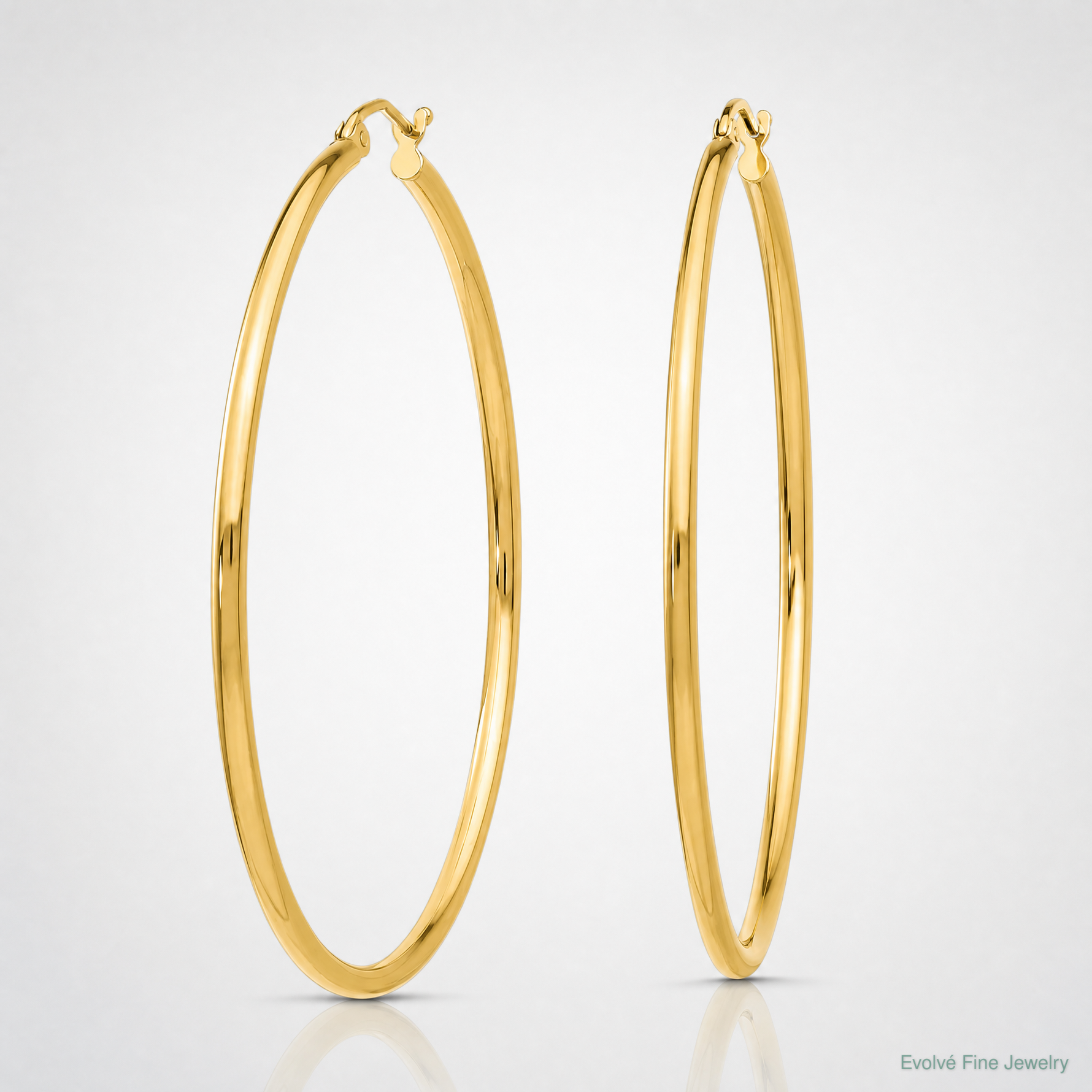 14k Polished 2x50mm  Lightweight Tube Hoop Earrings - Lifestyle View