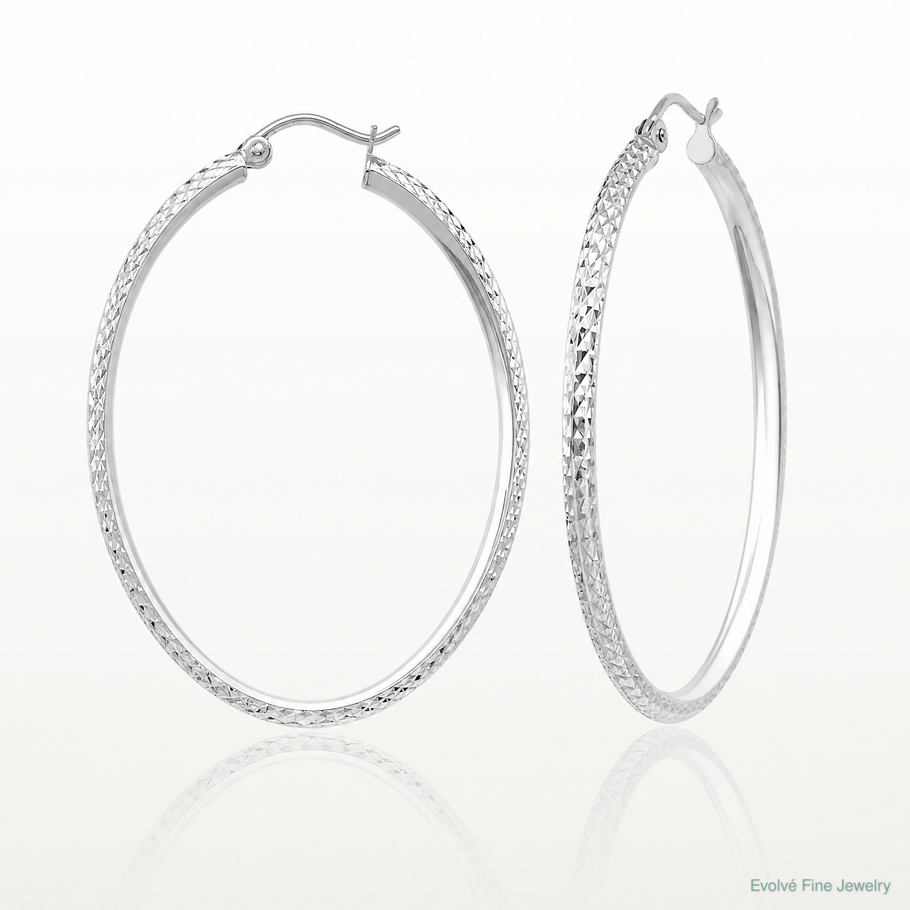 14K WG Knife Edge Diamond-cut Hollow Hoop Earrings - Lifestyle View