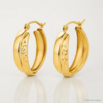 14k Polished Diamond-cut Twist Hoop Earrings - Lifestyle View