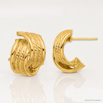 14K Polished and Textured Twisted Post Earrings - Lifestyle View