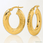 14K Polished and Diamond-cut Oval Hoop Earrings - Lifestyle View