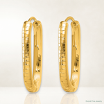 14k Polished and Grooved Oval Hinged Hoop Earrings - Lifestyle View