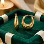 14k Polished Puffed Oval Hoop earrings - Lifestyle View