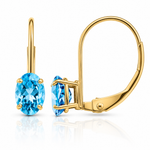 14k 6x4mm Oval Blue Topaz Leverback Earrings - Lifestyle View