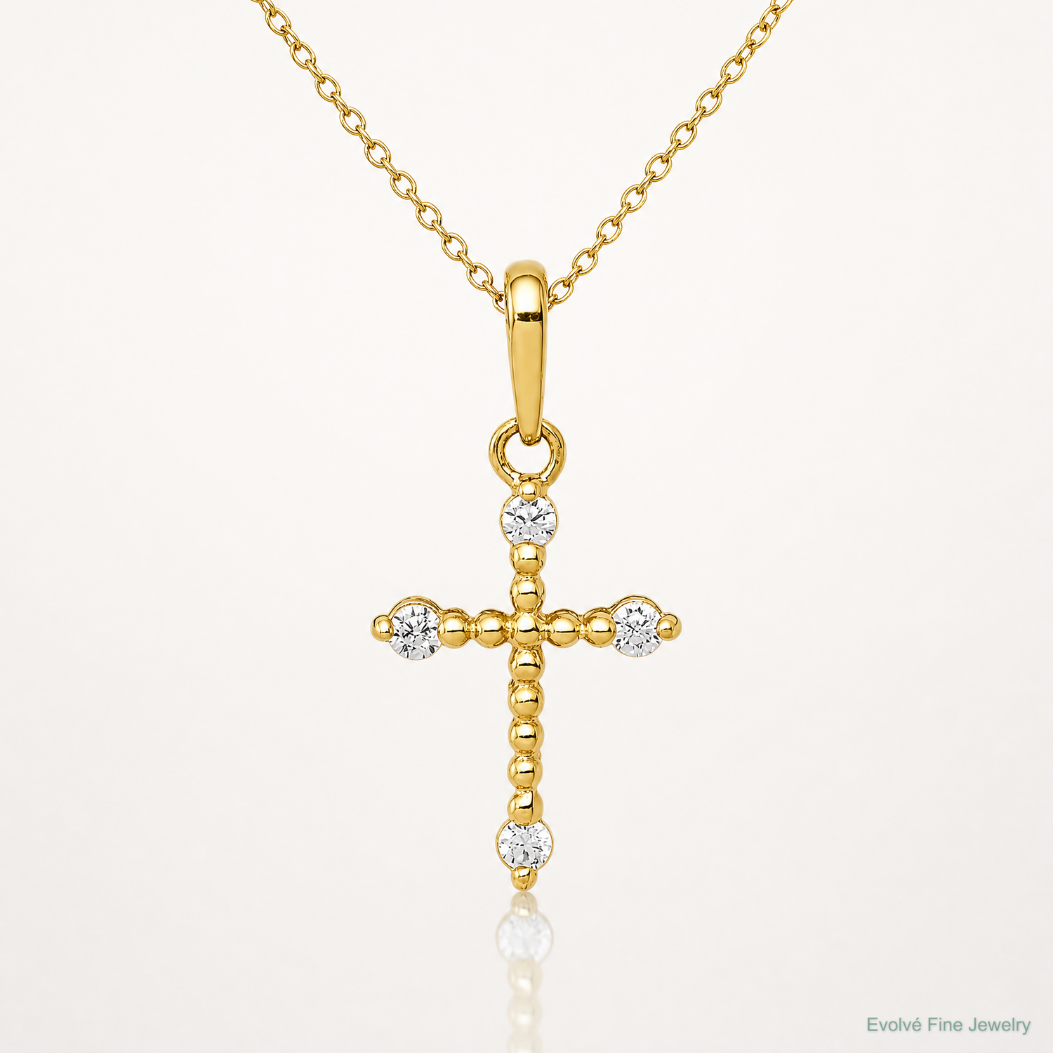 14k Polished Beaded CZ Cross Charm - Lifestyle View