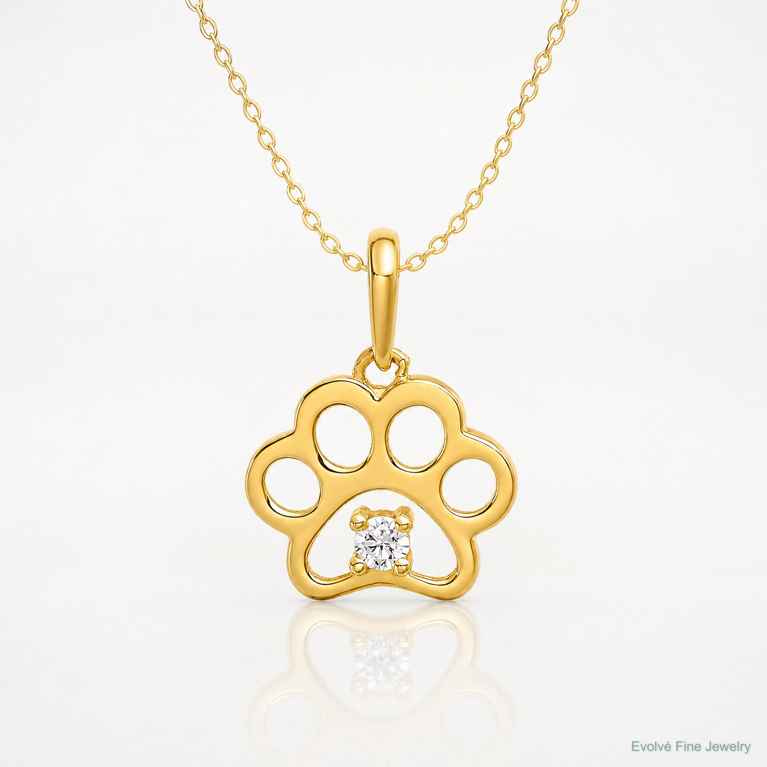 14k Polished CZ Paw Print Pendant - Lifestyle View
