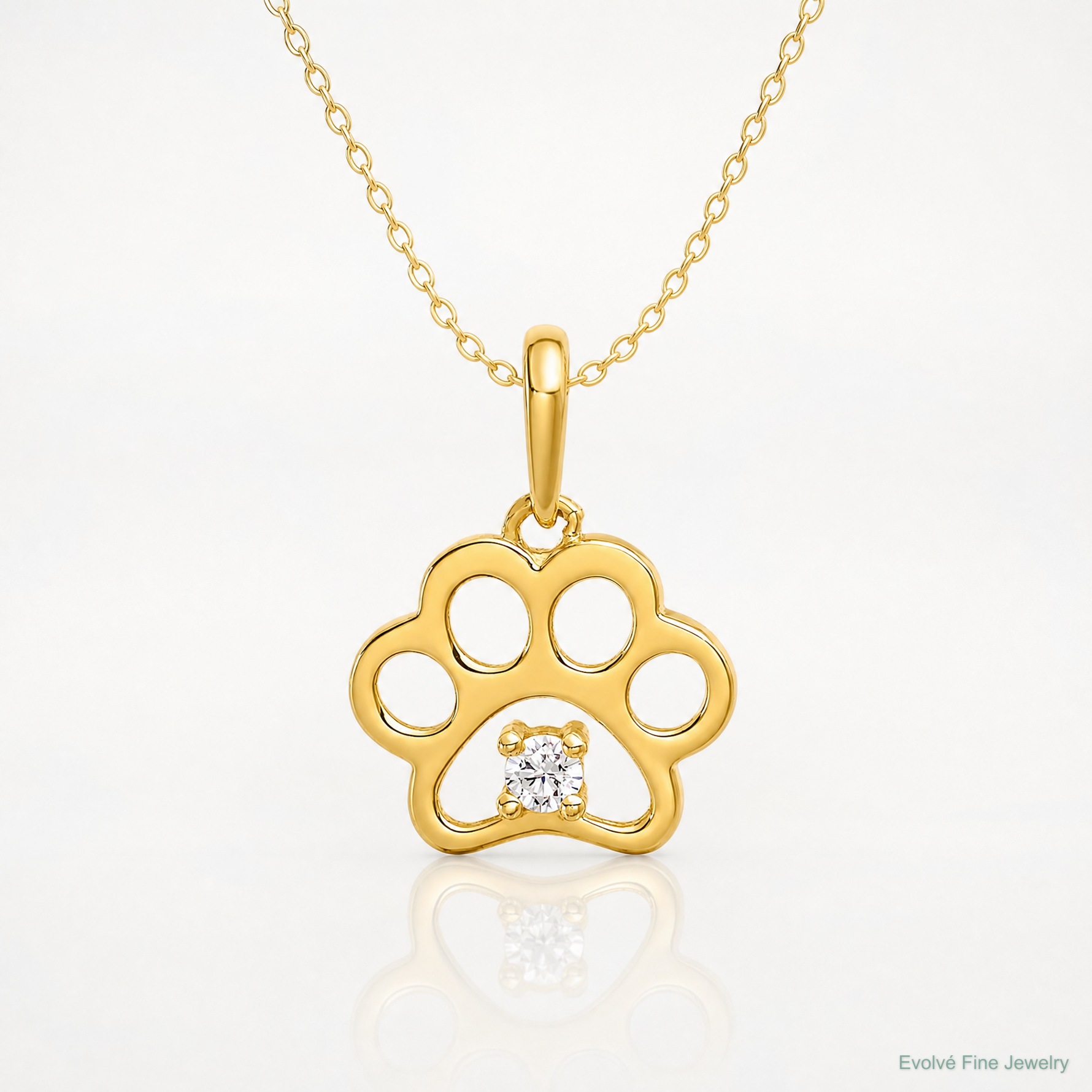 14k Polished CZ Paw Print Pendant - Lifestyle View