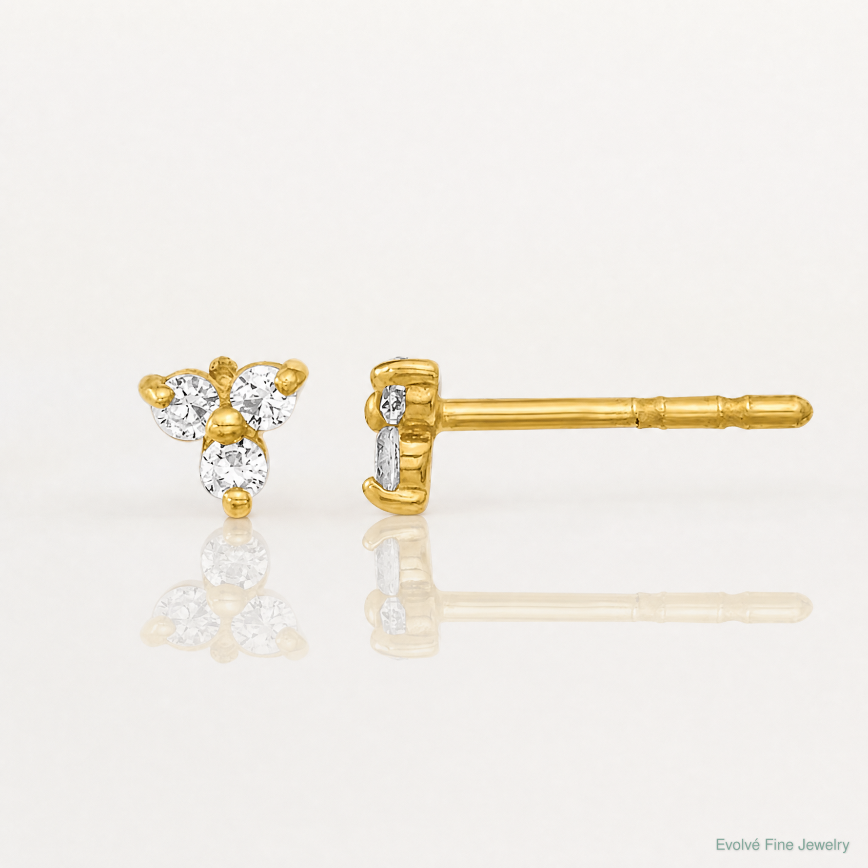 14K Polished CZ Triangle Post Earrings - Lifestyle View