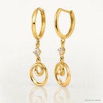 14k Twisted Dangling Circle Hinged Round Hoop Earrings - Lifestyle View