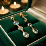 14k Blue Topaz Gemstone Dangle Earrings - Lifestyle View